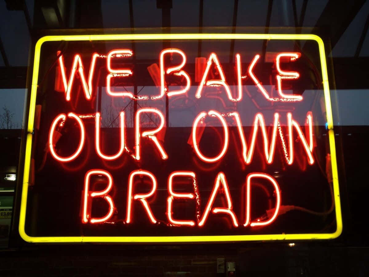 Neon Sign Bakery Promotion Wallpaper