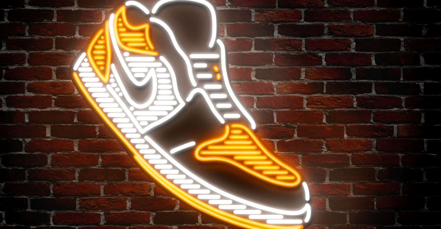 Neon Sneaker Sign Brick Wall Wallpaper