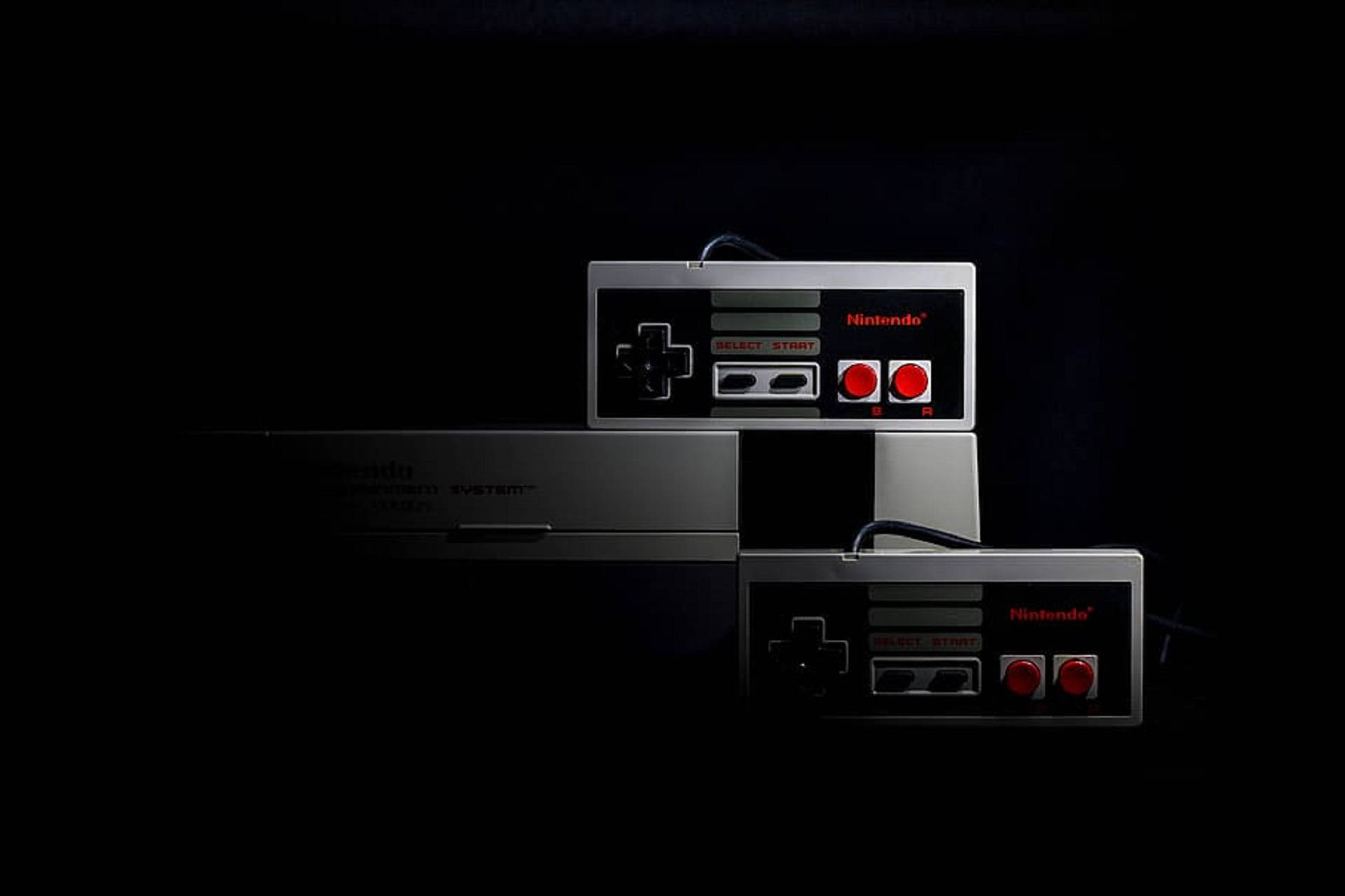 NES Gaming Set In Dark Wallpaper