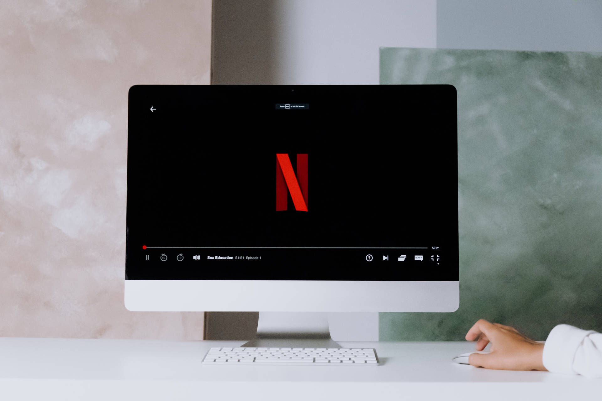 Netflix Logo On Computer Screen Wallpaper