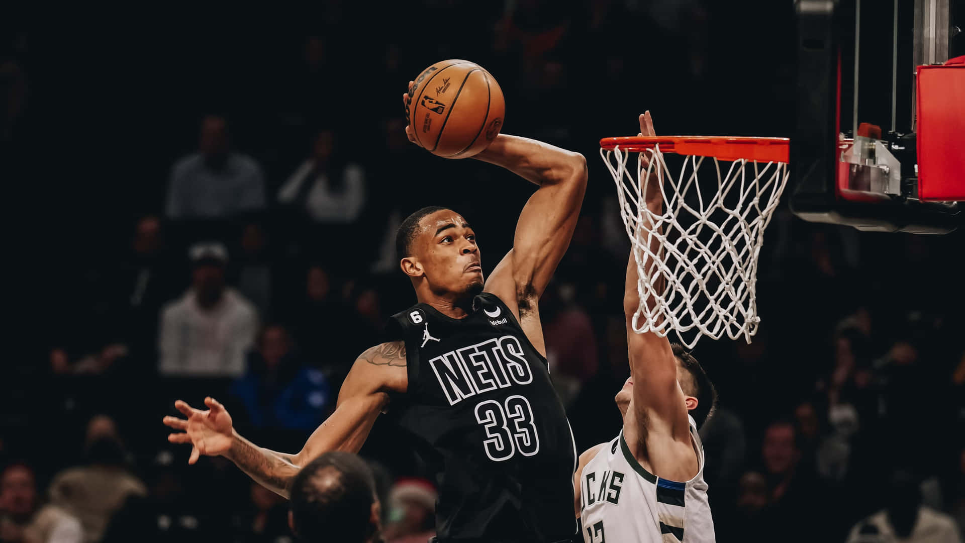 Nets Player Dunking During Game Wallpaper