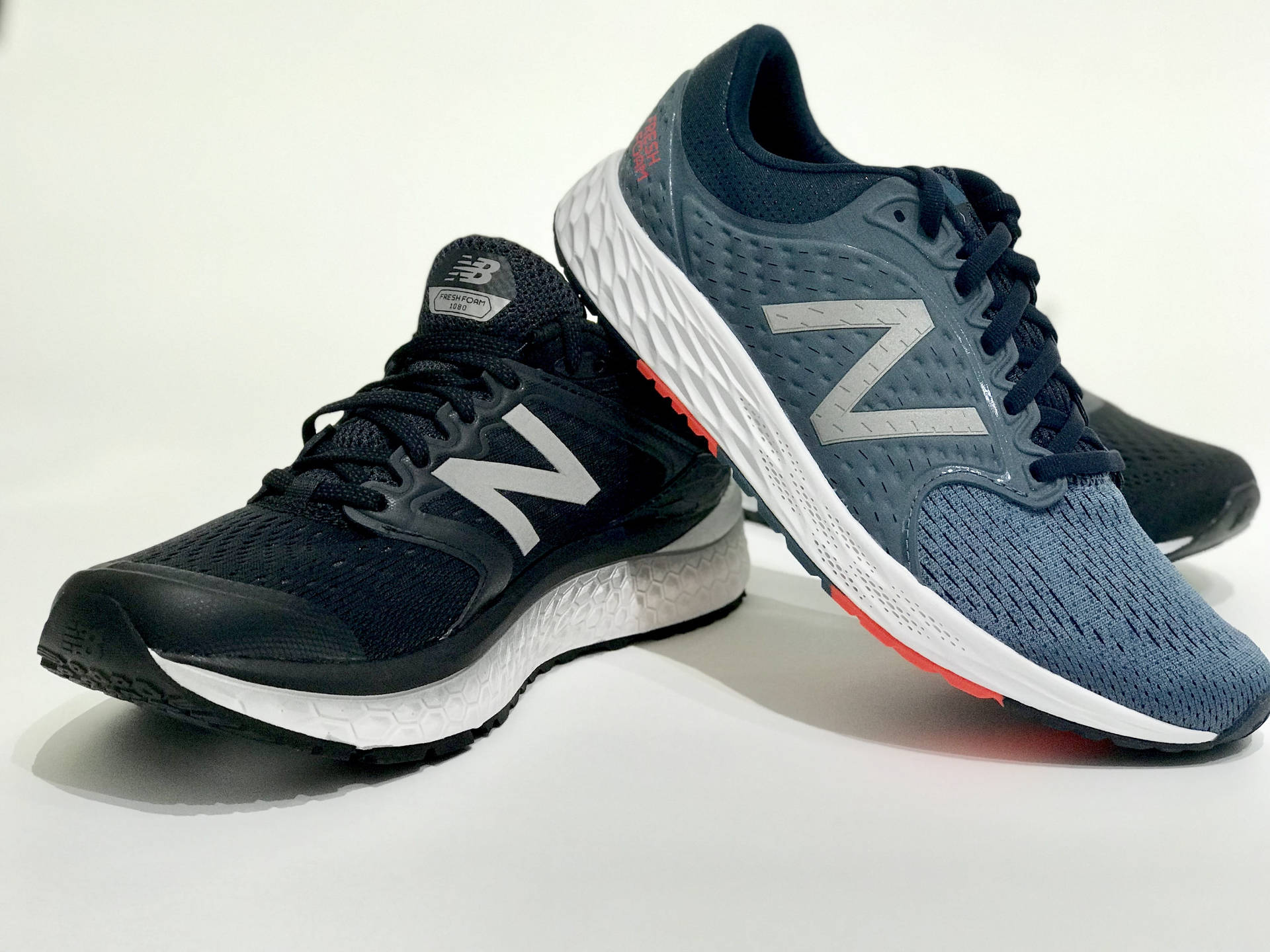 New Balance Different Coloured Pair Wallpaper