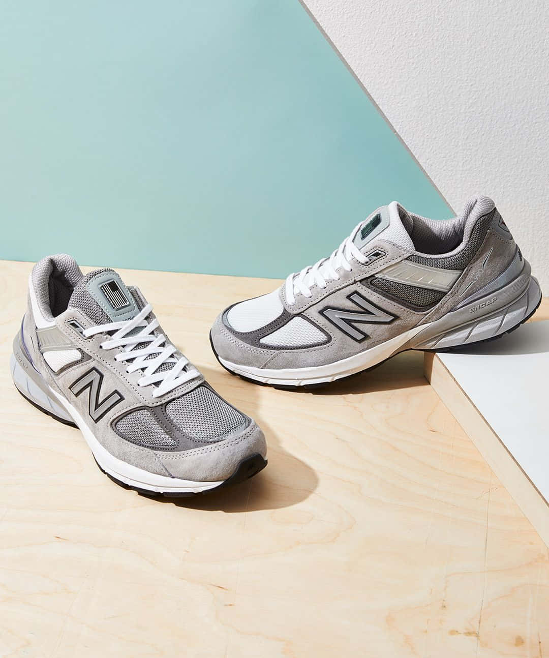 Step Up Your Game with Grey New Balance 990 Sneakers