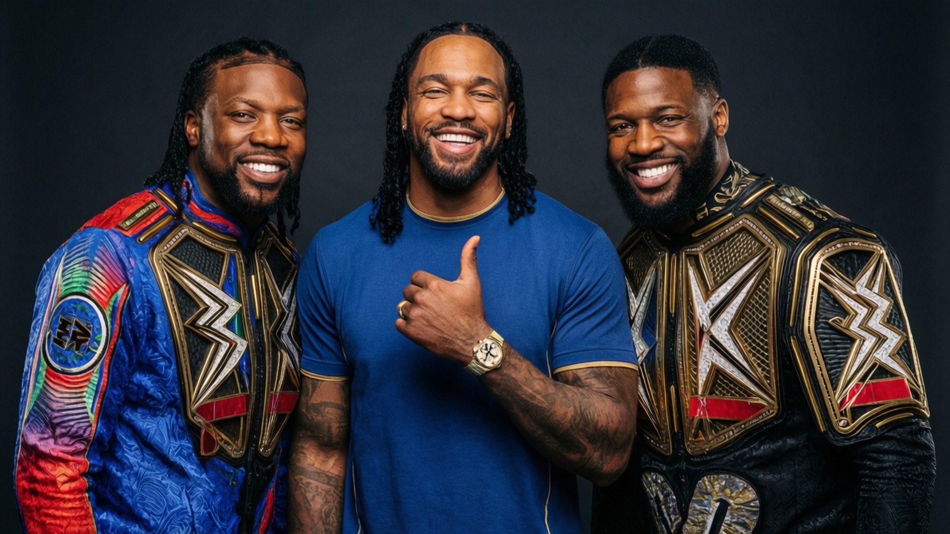 Kofi Kingston står sammen med Big E og Xavier Woods, New Day-trioen.
