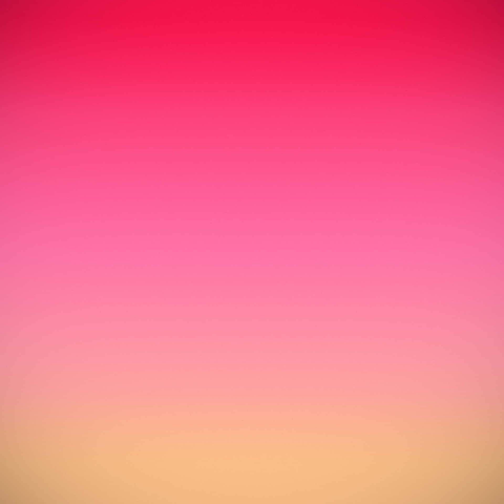 A Pink And Yellow Gradient Background Wallpaper