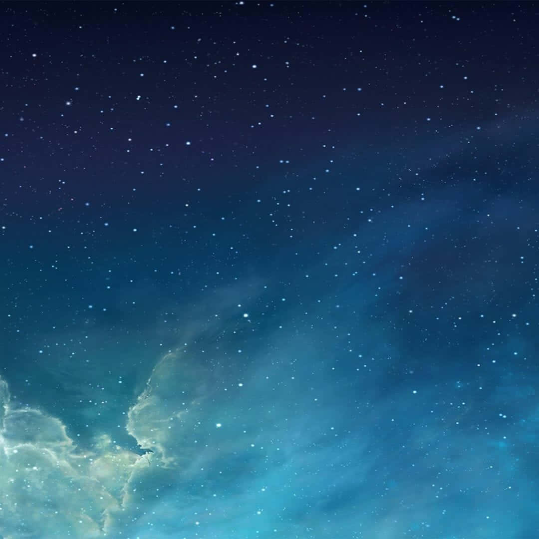 En iPhone med en blå himmel og stjerner Wallpaper
