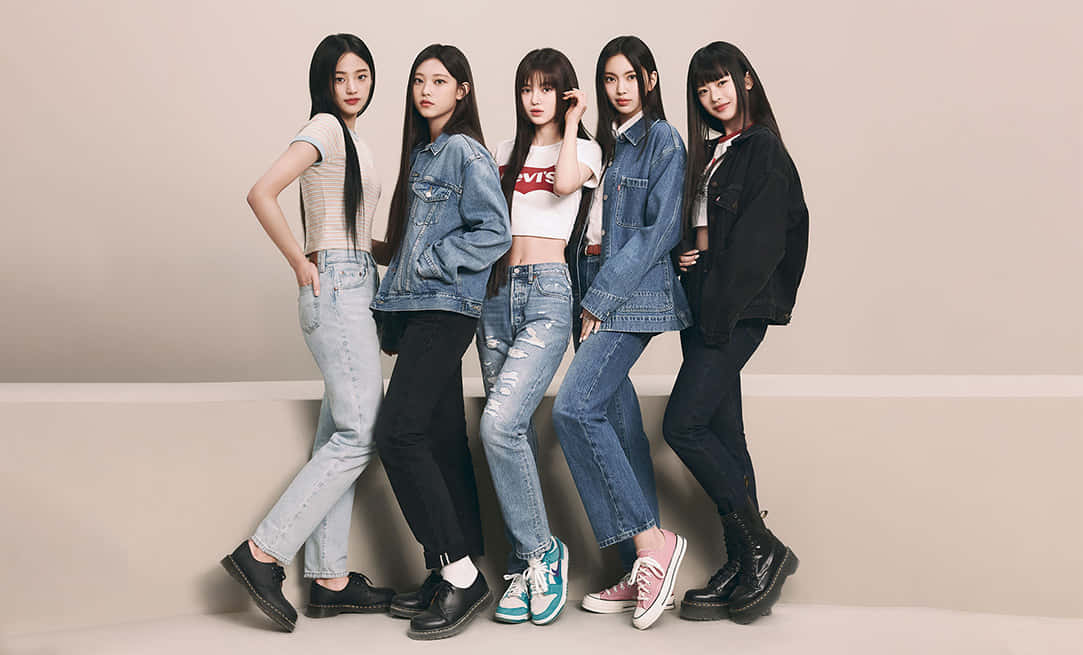 New Jeans_ Group_ Pose_ Denim_ Style Wallpaper