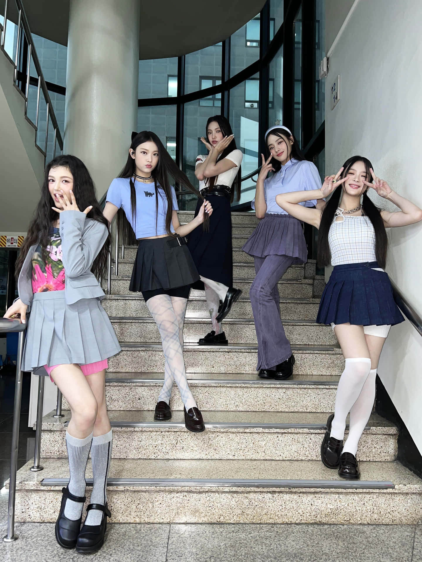 New Jeans_ Group_ Staircase_ Pose Wallpaper