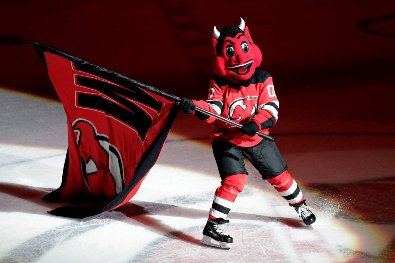 "Enthusiastic New Jersey Devils Mascot Pumping Up The Crowd" Wallpaper