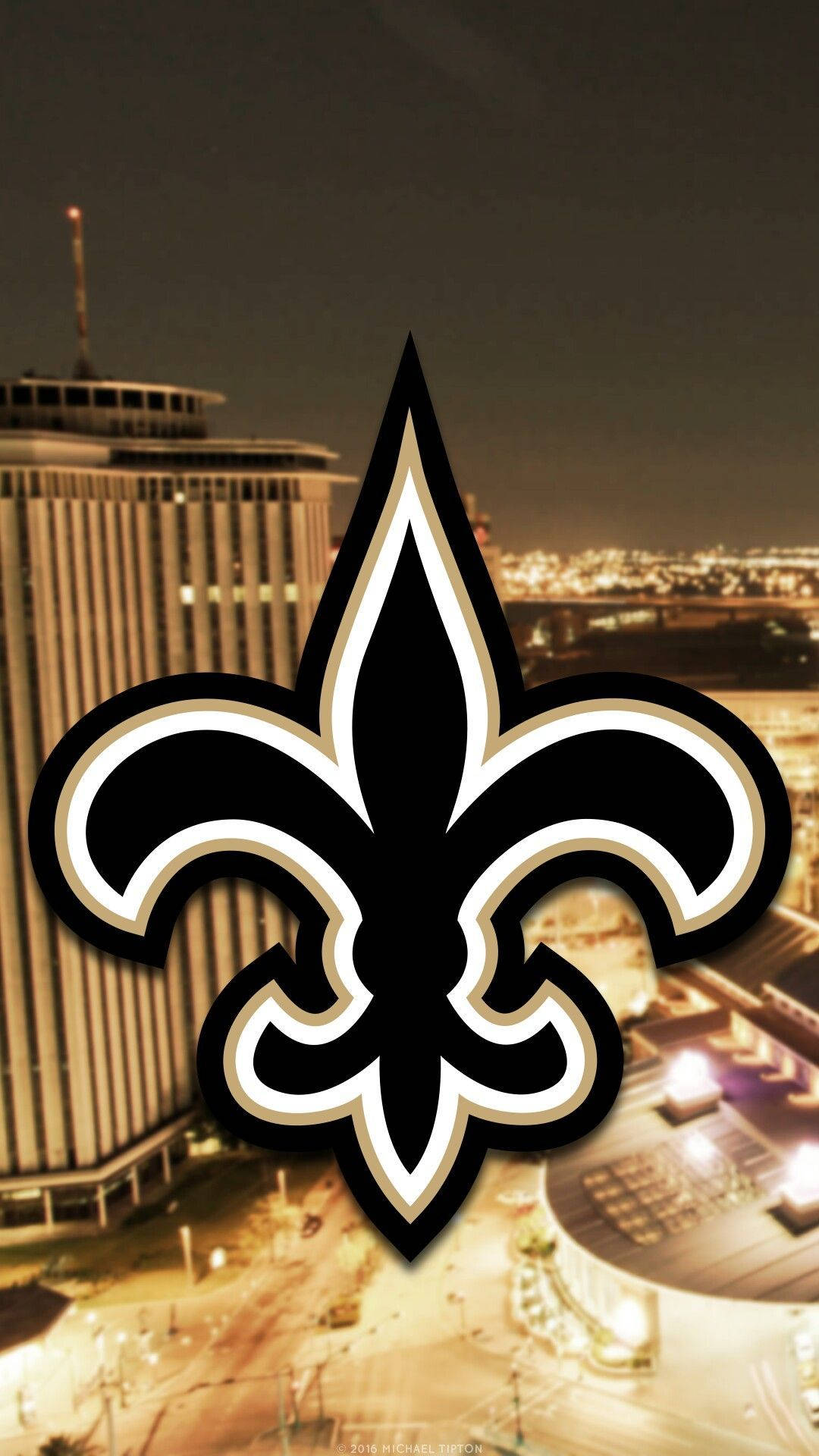 New Orleans Saints Logo With Buildings Wallpaper