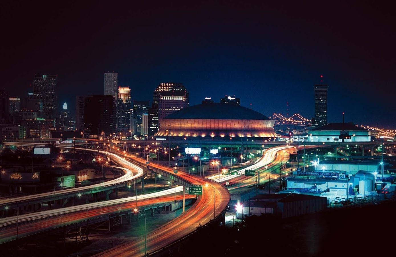 Striking Night View of the Superdome in New Orleans Wallpaper