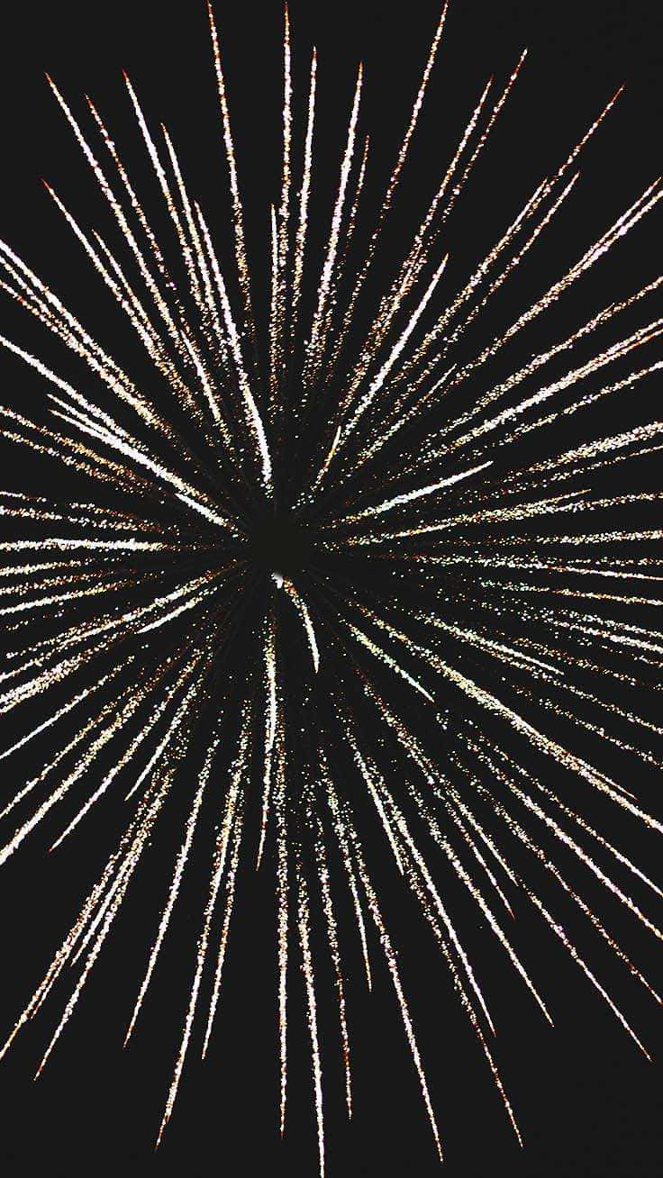 Fireworks In The Sky With A Black Background Wallpaper