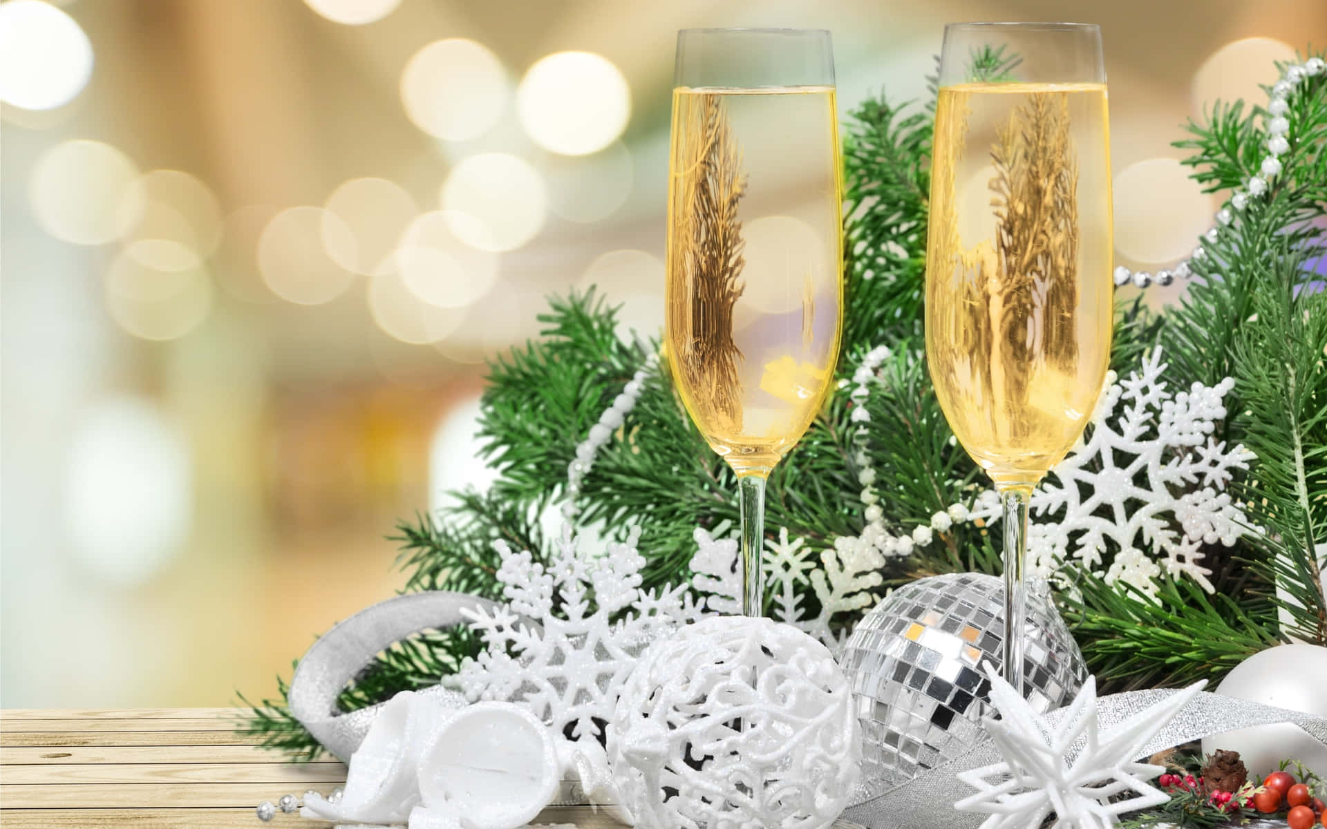 Two Glasses Of Champagne With Christmas Decorations