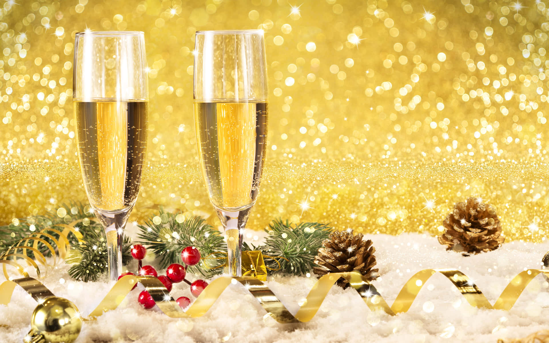 Two Glasses Of Champagne On A Gold Background
