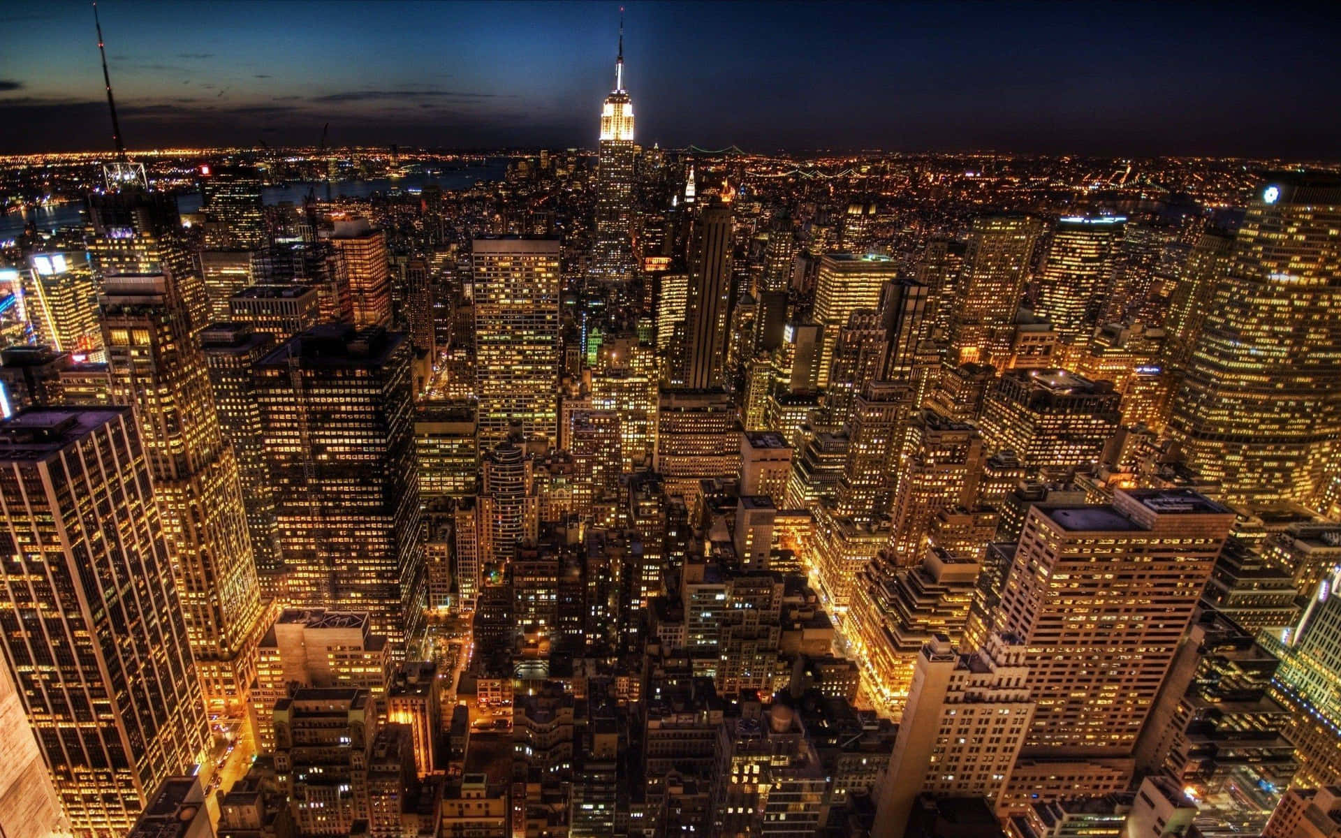 Immaginedi New York City Di Notte In Oro.