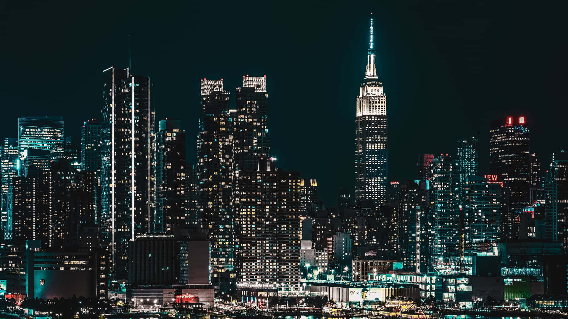 Imagende La Ciudad De Nueva York De Noche En Tonos Azul Neón.
