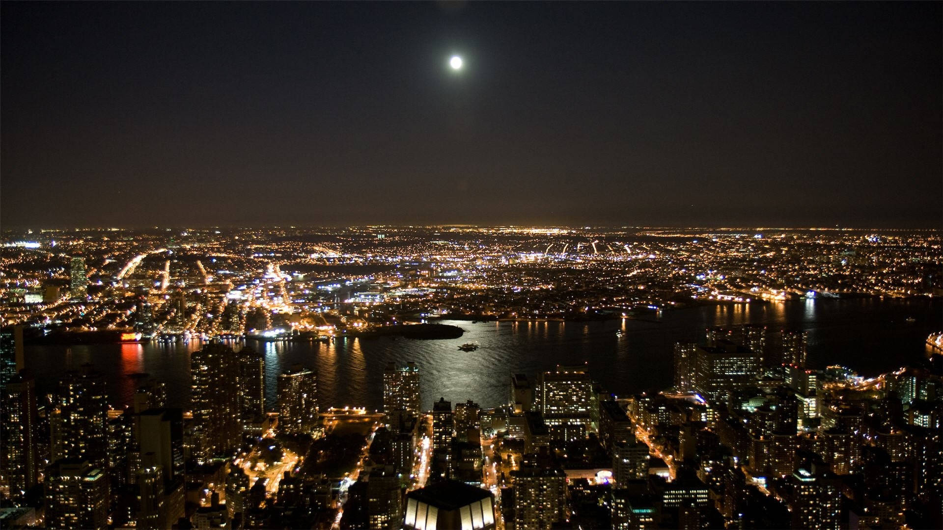 Nochede La Ciudad De Nueva York Con Luna Llena Fondo de pantalla