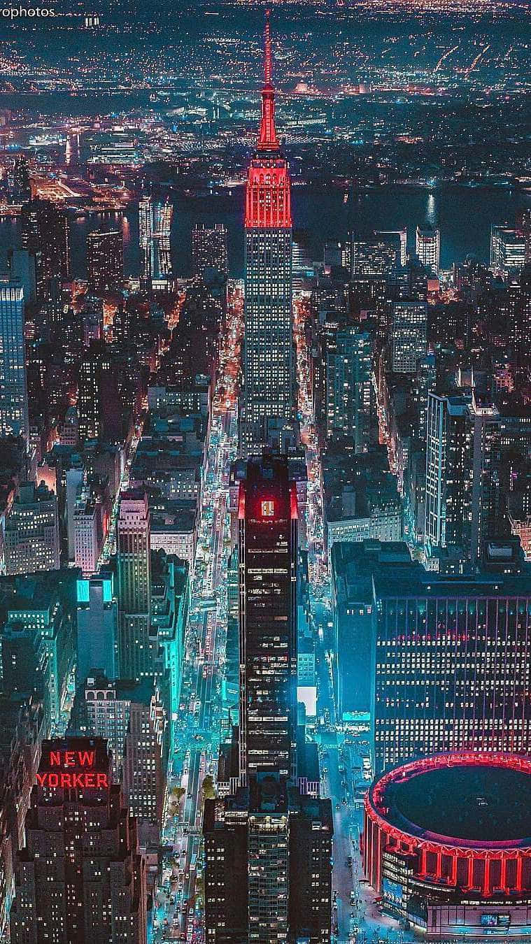 Ilpaesaggio Notturno Urbano Di New York City Sfondo
