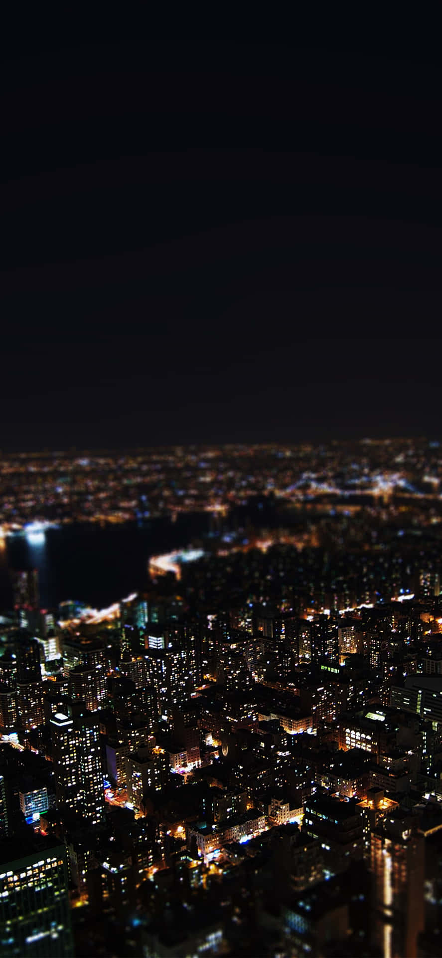 Ottienila Vista Notturna Perfetta Della Città Di New York Sfondo