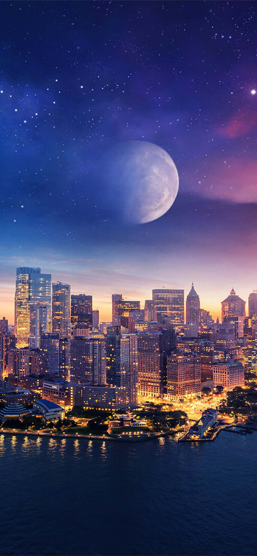 Enjoy an Evenings View of the Lights of the New York City Skyline Wallpaper