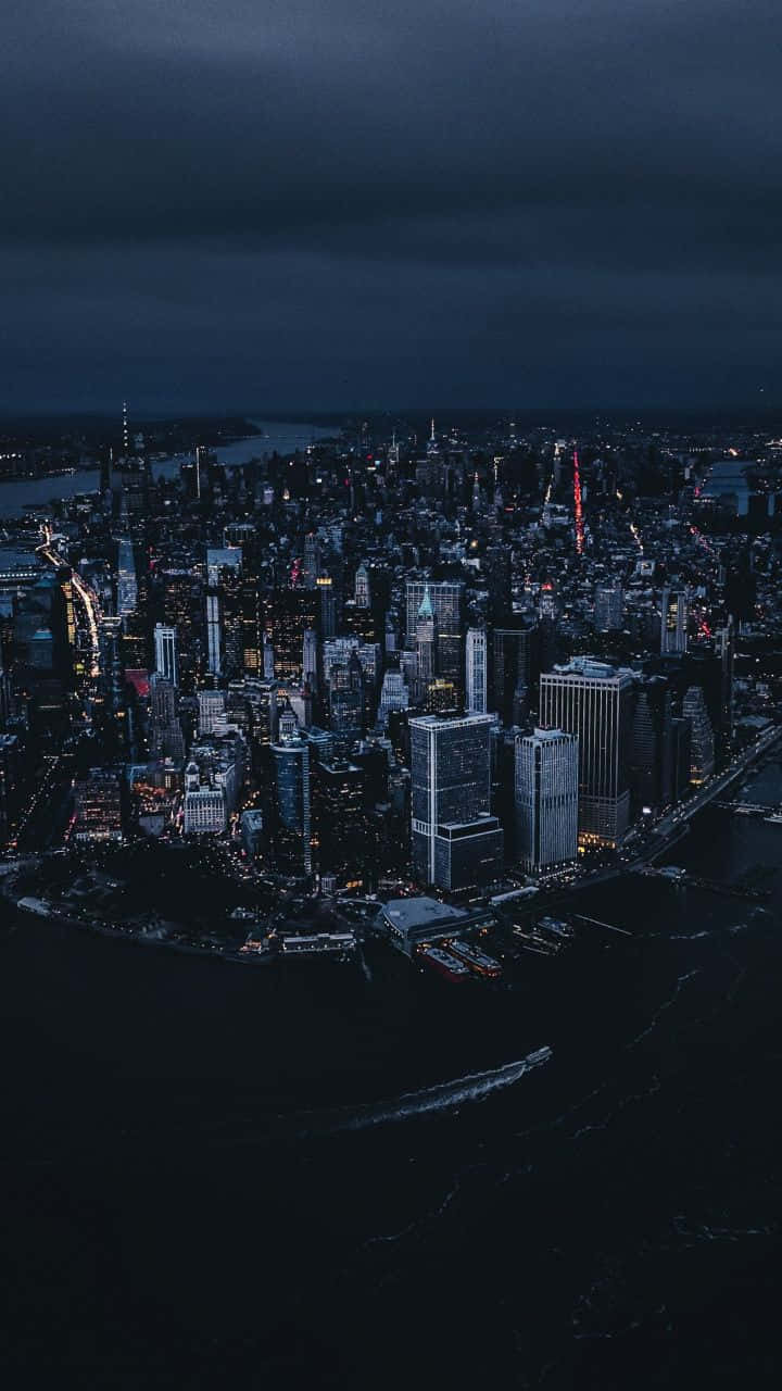 Download New York City Night Darkness Iphone Wallpaper | Wallpapers.com