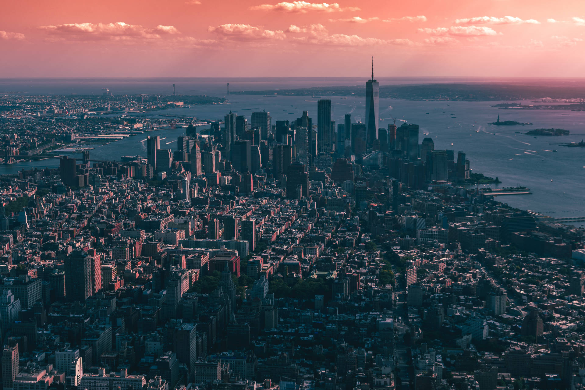 An aerial view of the dramatic red skyline of New York City Wallpaper