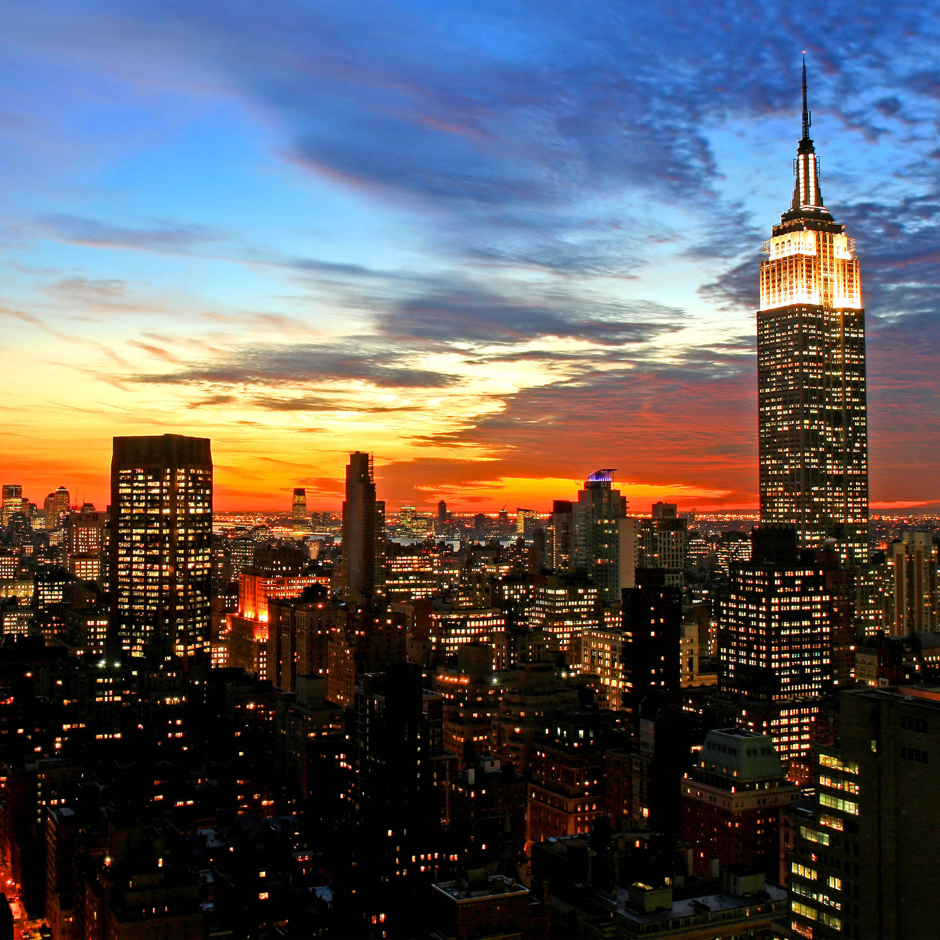 Lavibrante Skyline Di New York City Vista Dal Comfort Del Tuo Iphone. Sfondo