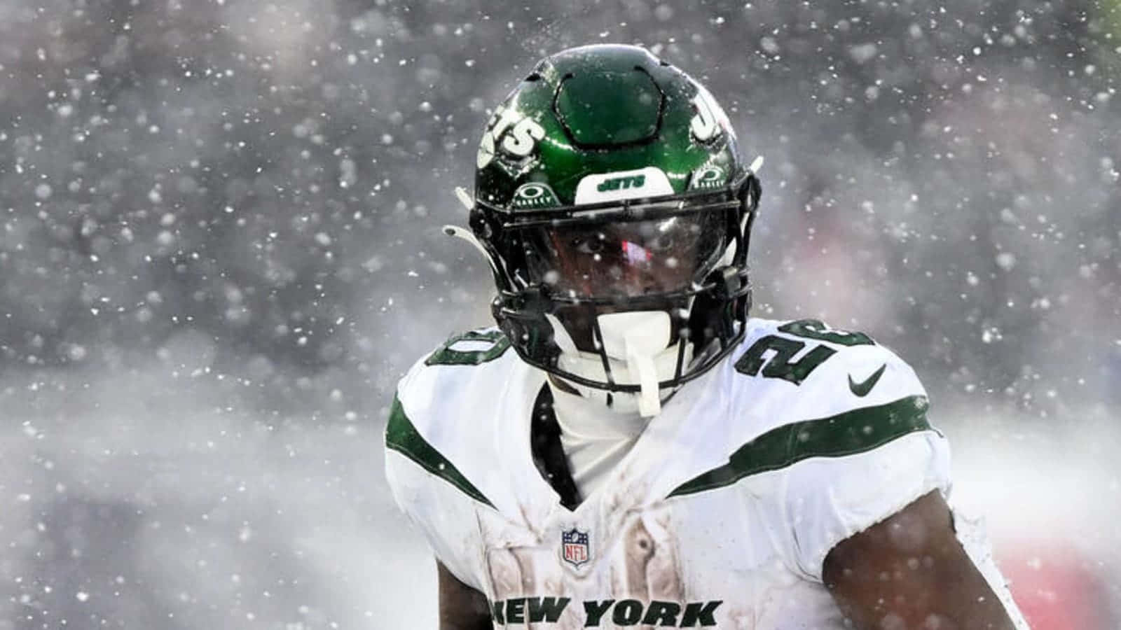 New York Jets Playerin Snowy Weather Wallpaper