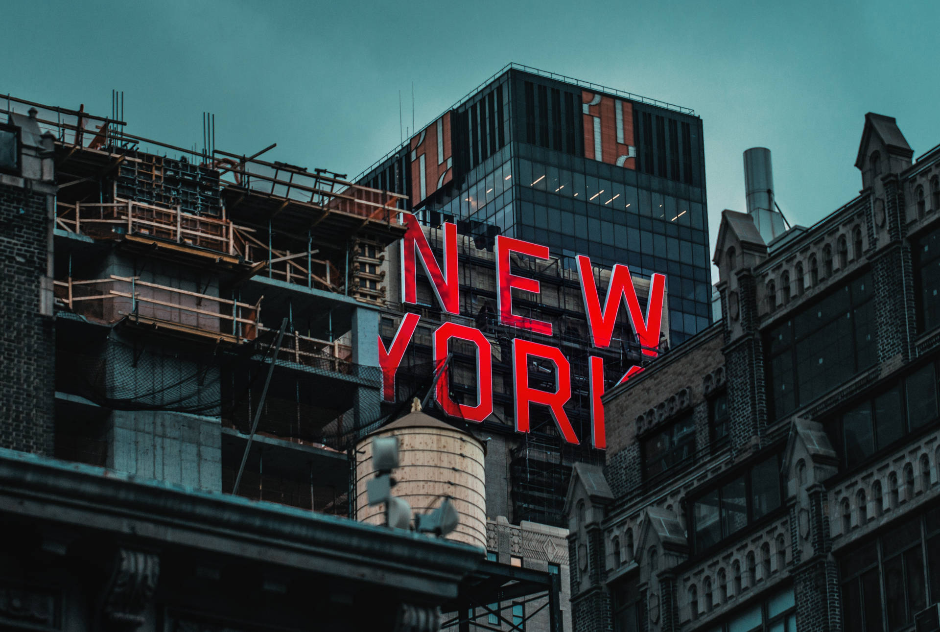 Red Neon Building Sign in NYC Wallpaper