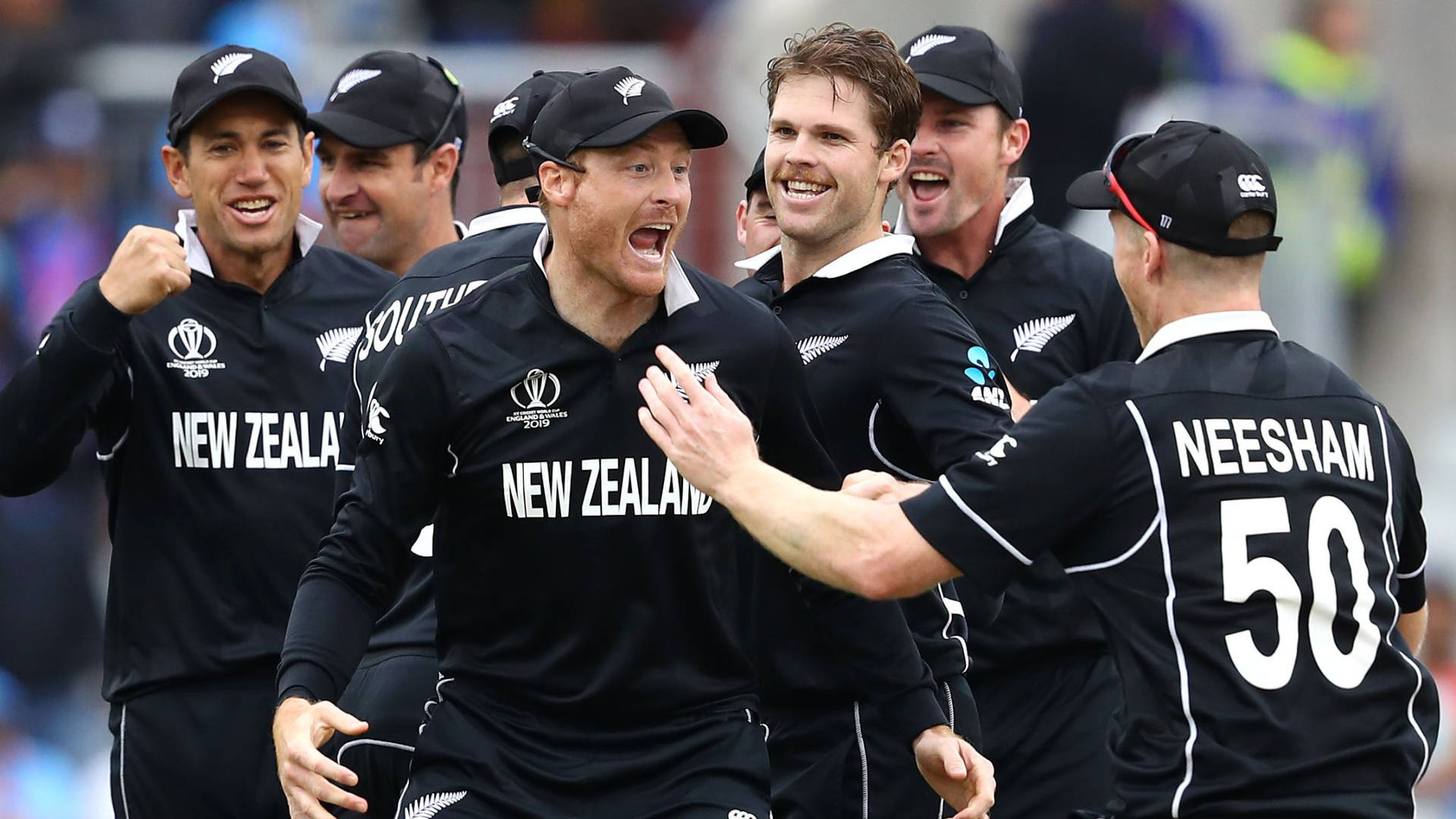Jubilant New Zealand Cricket Team celebrating a victory Wallpaper
