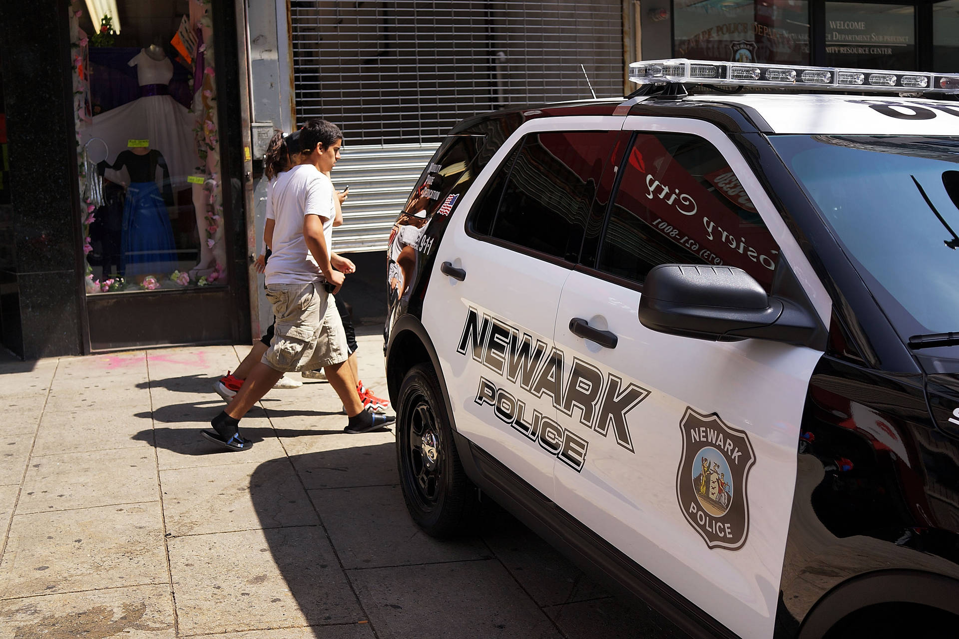 Newark Police Car Parked Outside Wallpaper