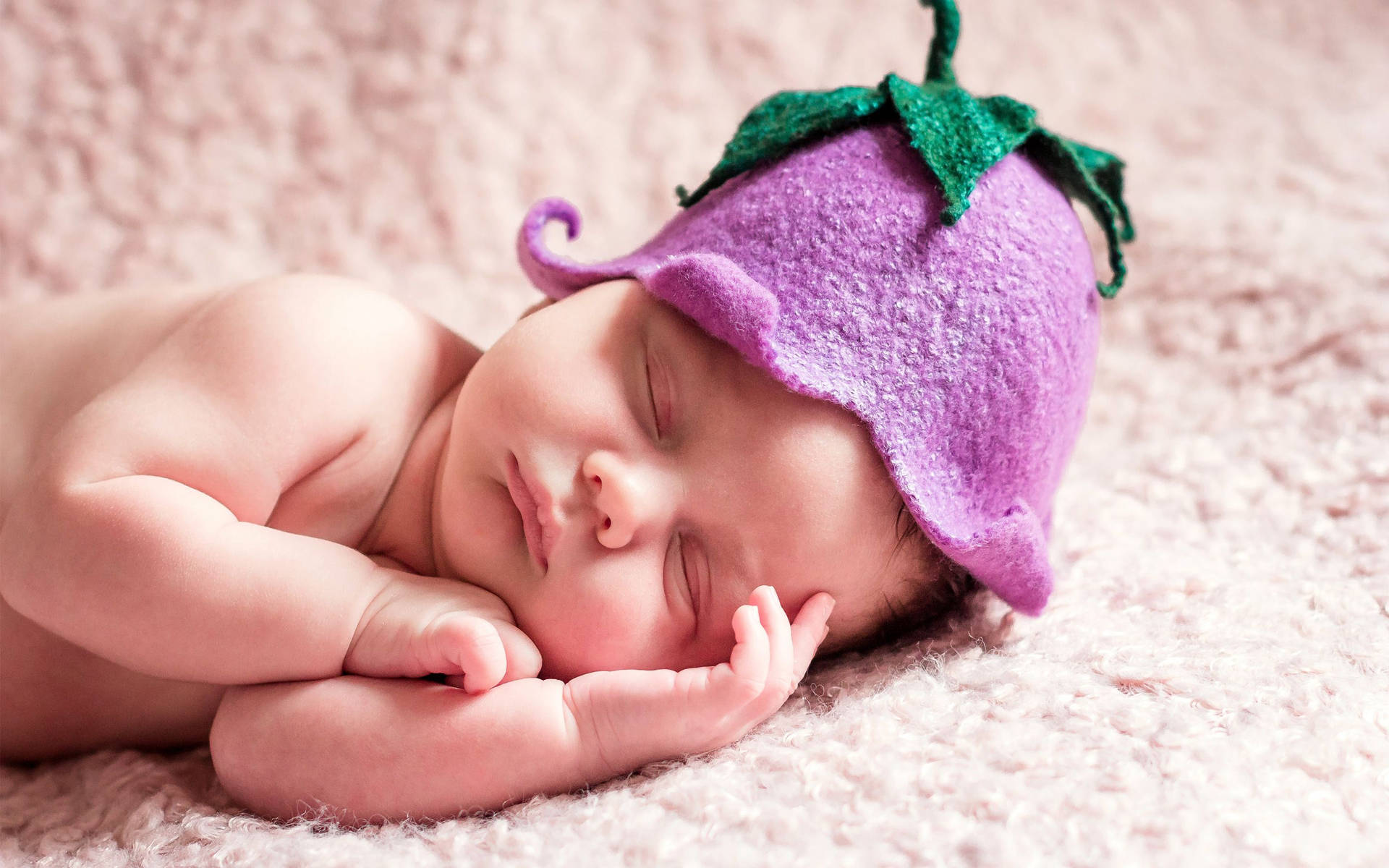 Newborn Baby Eggplant Bonnet Wallpaper