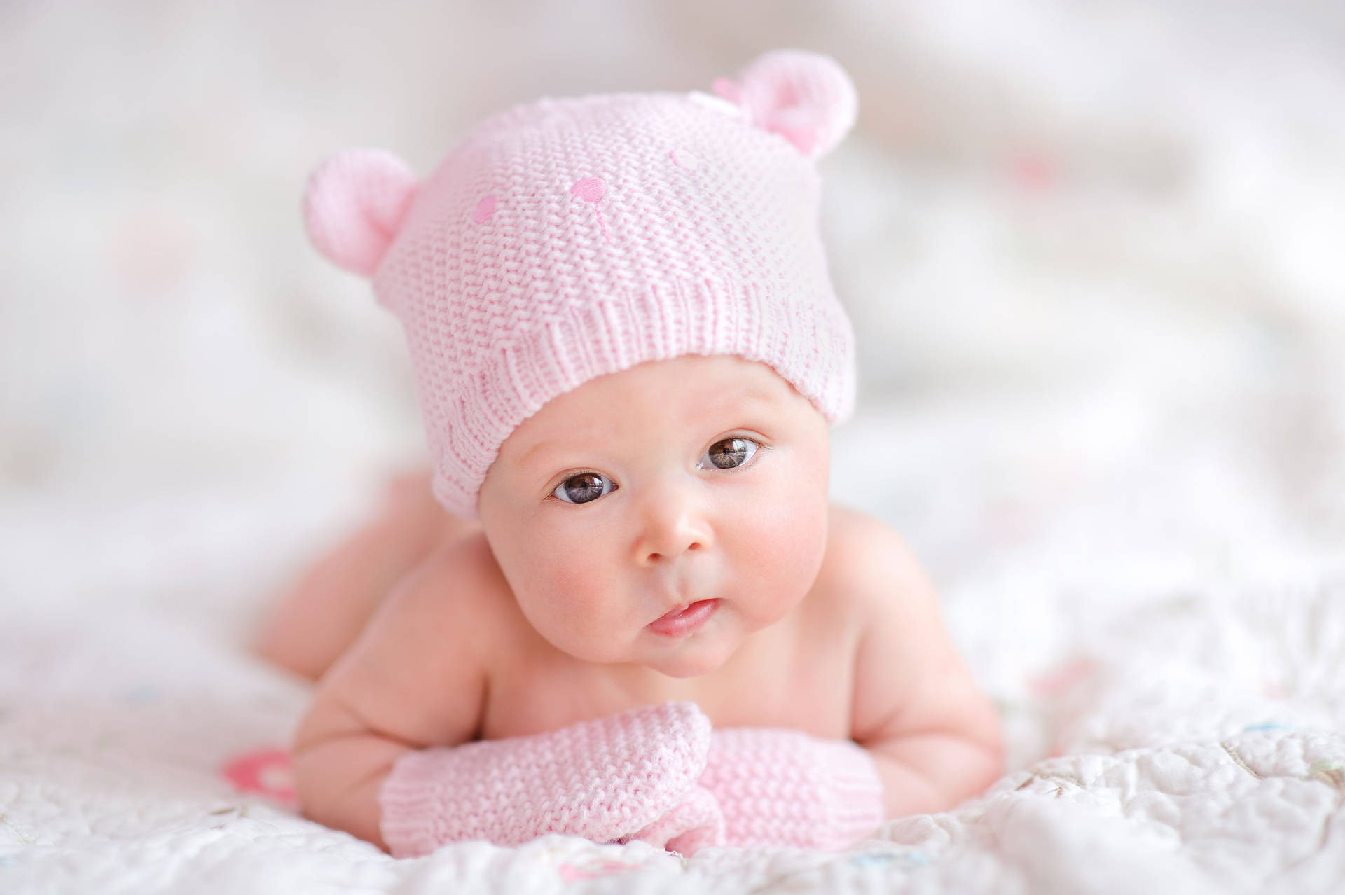 Newborn Baby Pink Hand Gloves Wallpaper