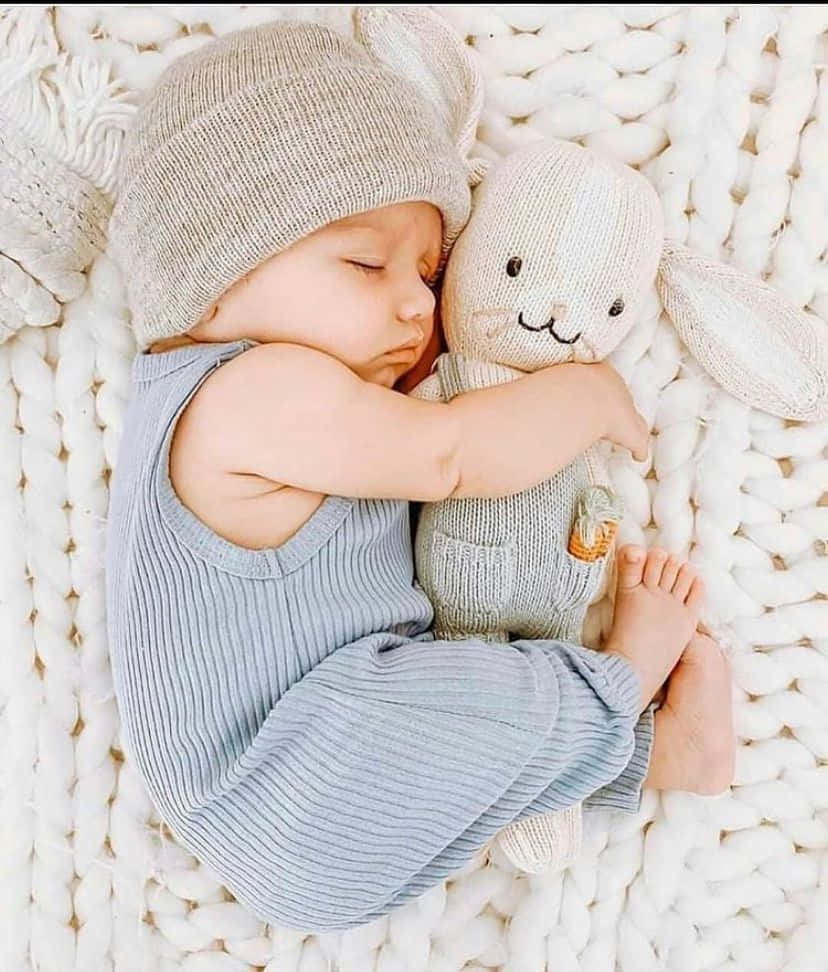 Newborn Hugging Stuffed Toy Rabbit Pictures