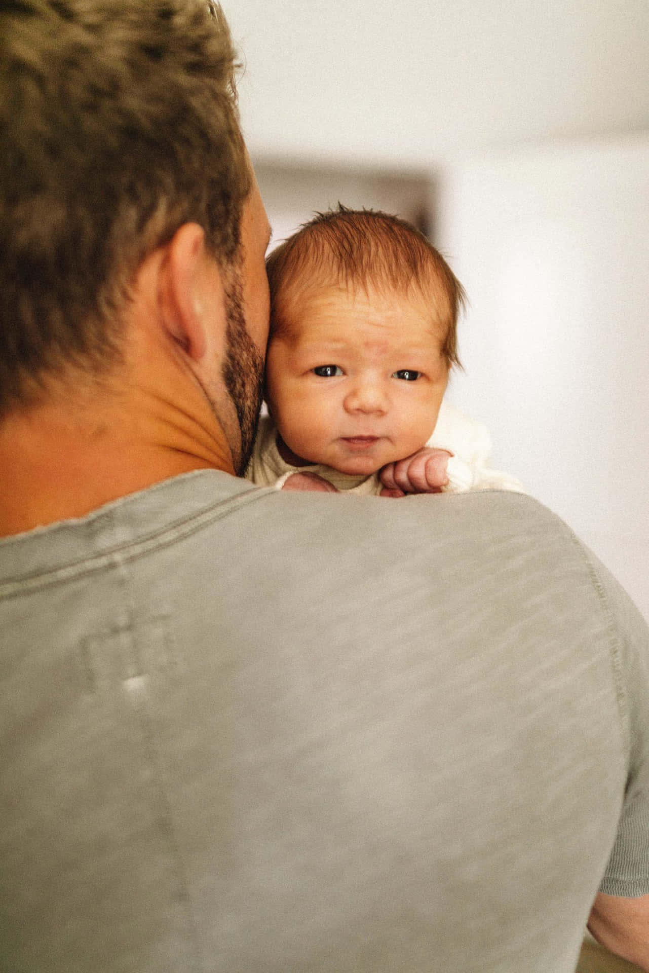 Newborn With Father On Shoulder Pictures