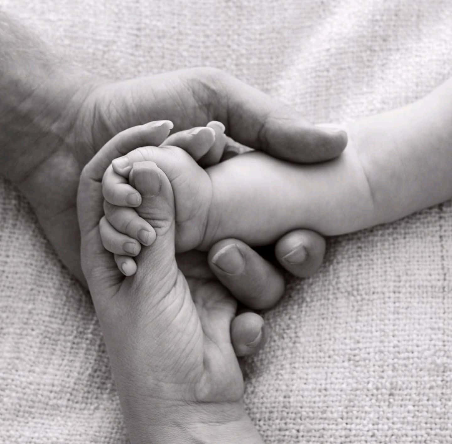 Newborn Parents Holding Hands Pictures