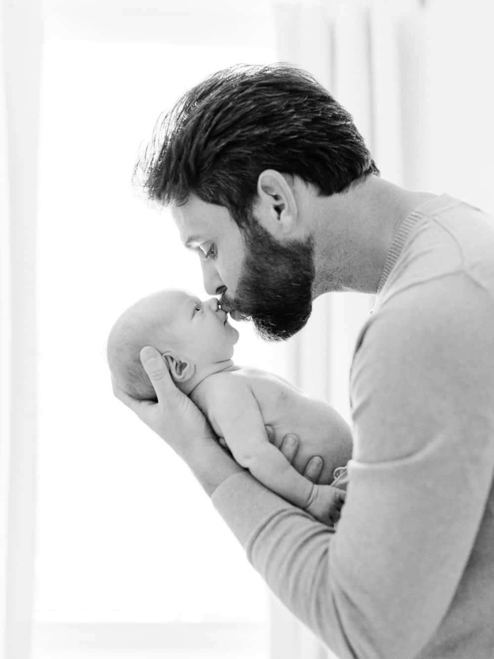 Newborn Father Kissing Baby Pictures