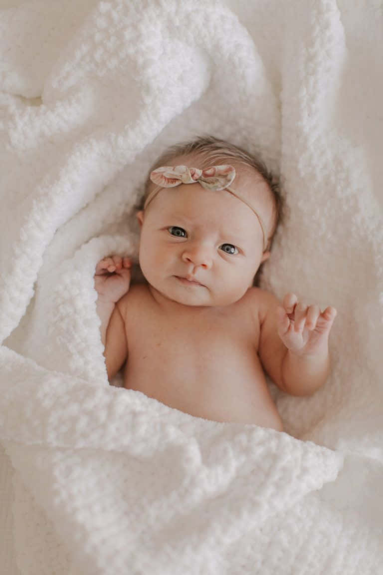 Newborn Baby Girl With Ribbon Pictures