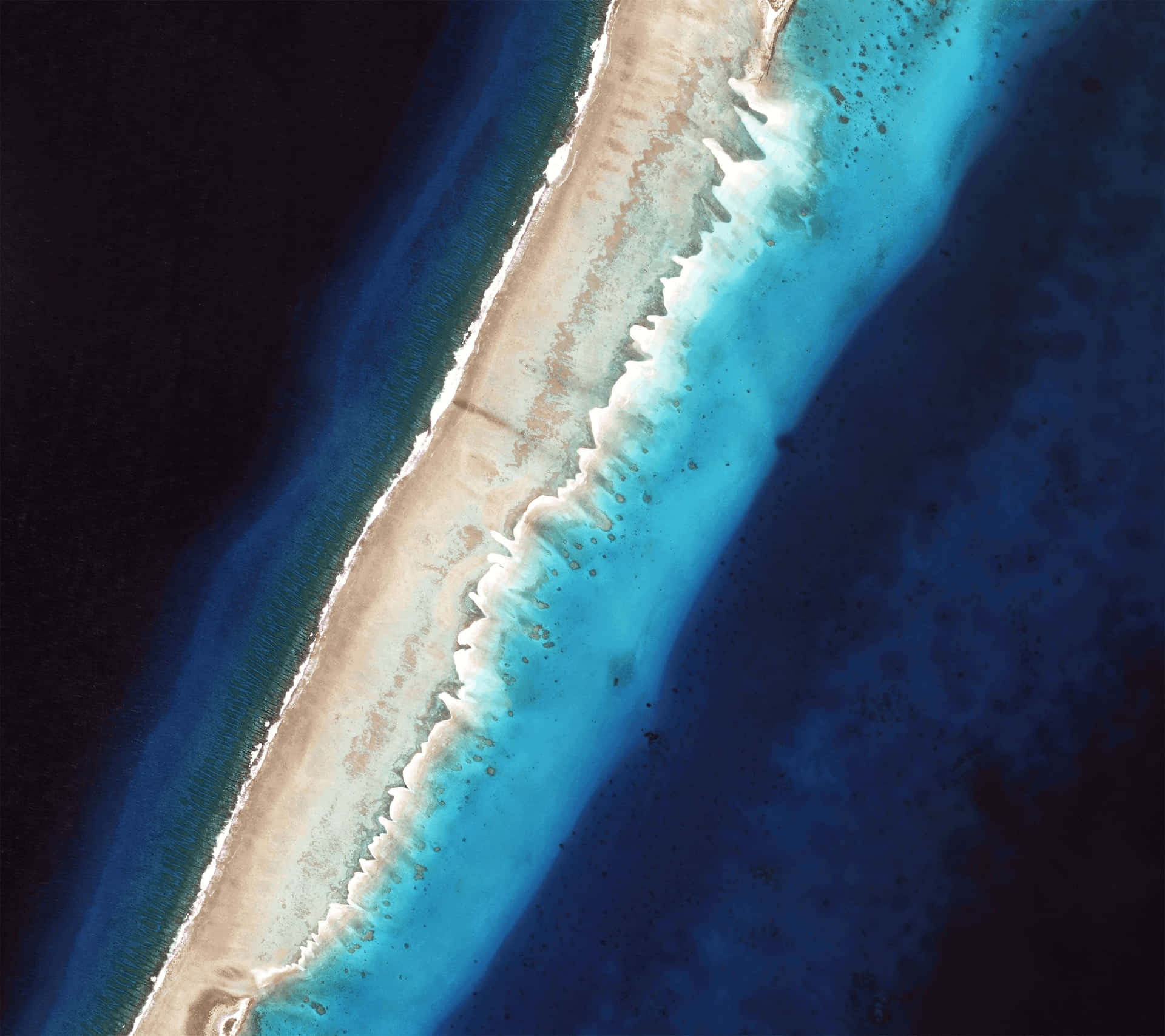 A Satellite Image Of The Coral Reef Wallpaper