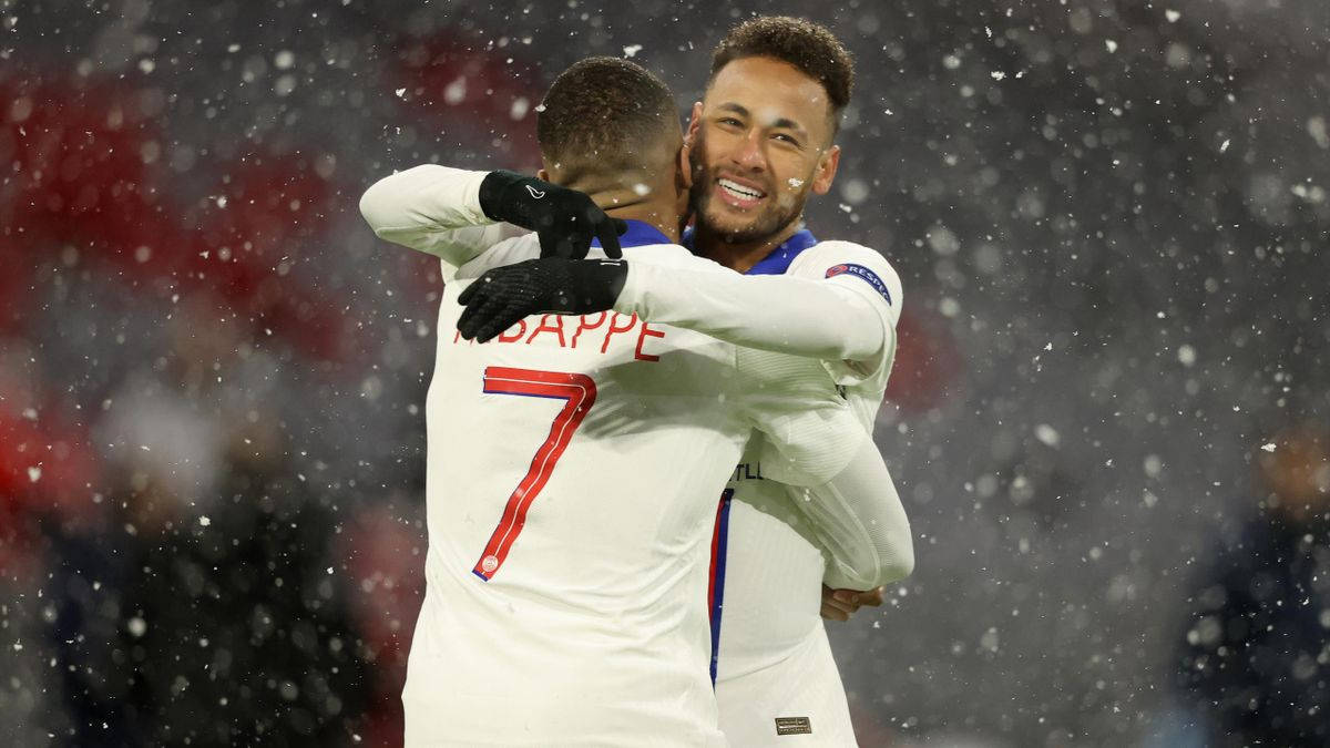 Neymar And Mbappe Hug In Snow Wallpaper