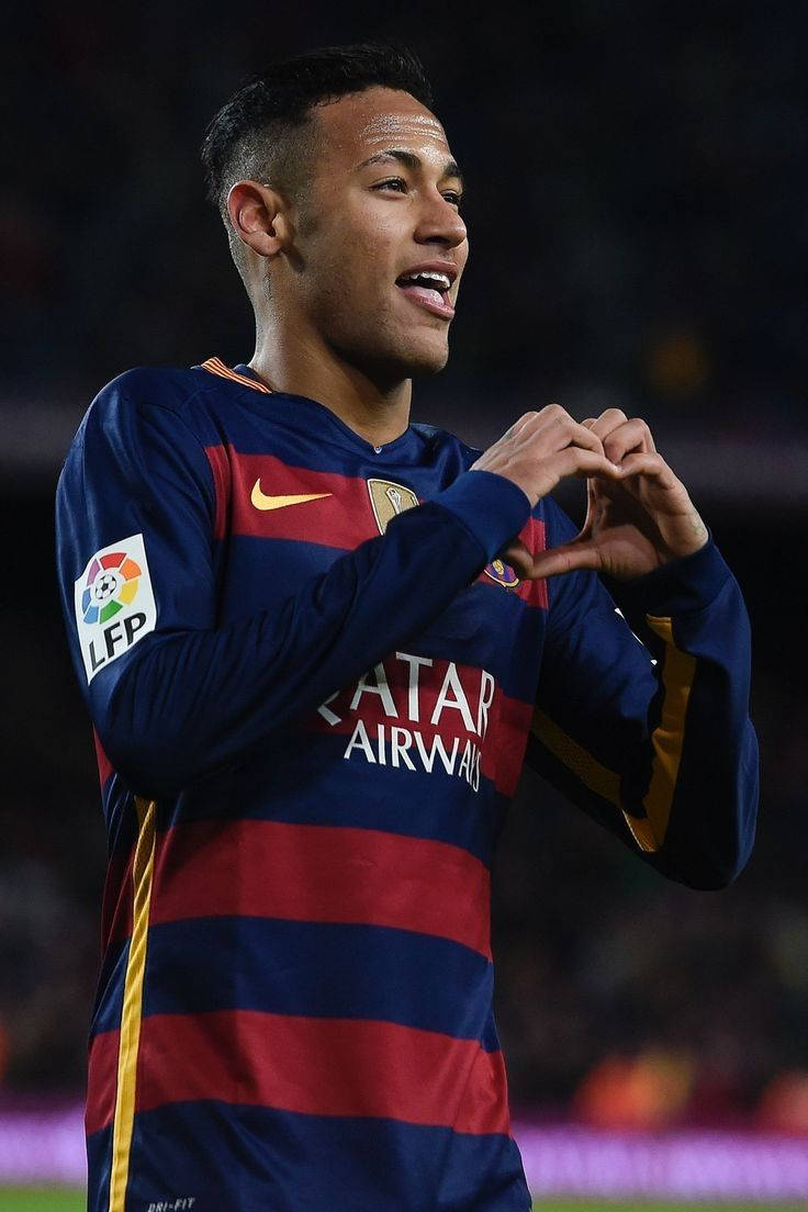 Neymar Overtakes Opponents with Heart-Hand Symbol Wallpaper