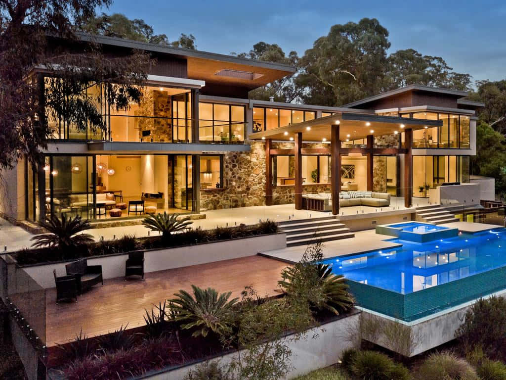 A Modern Home With A Pool And Deck