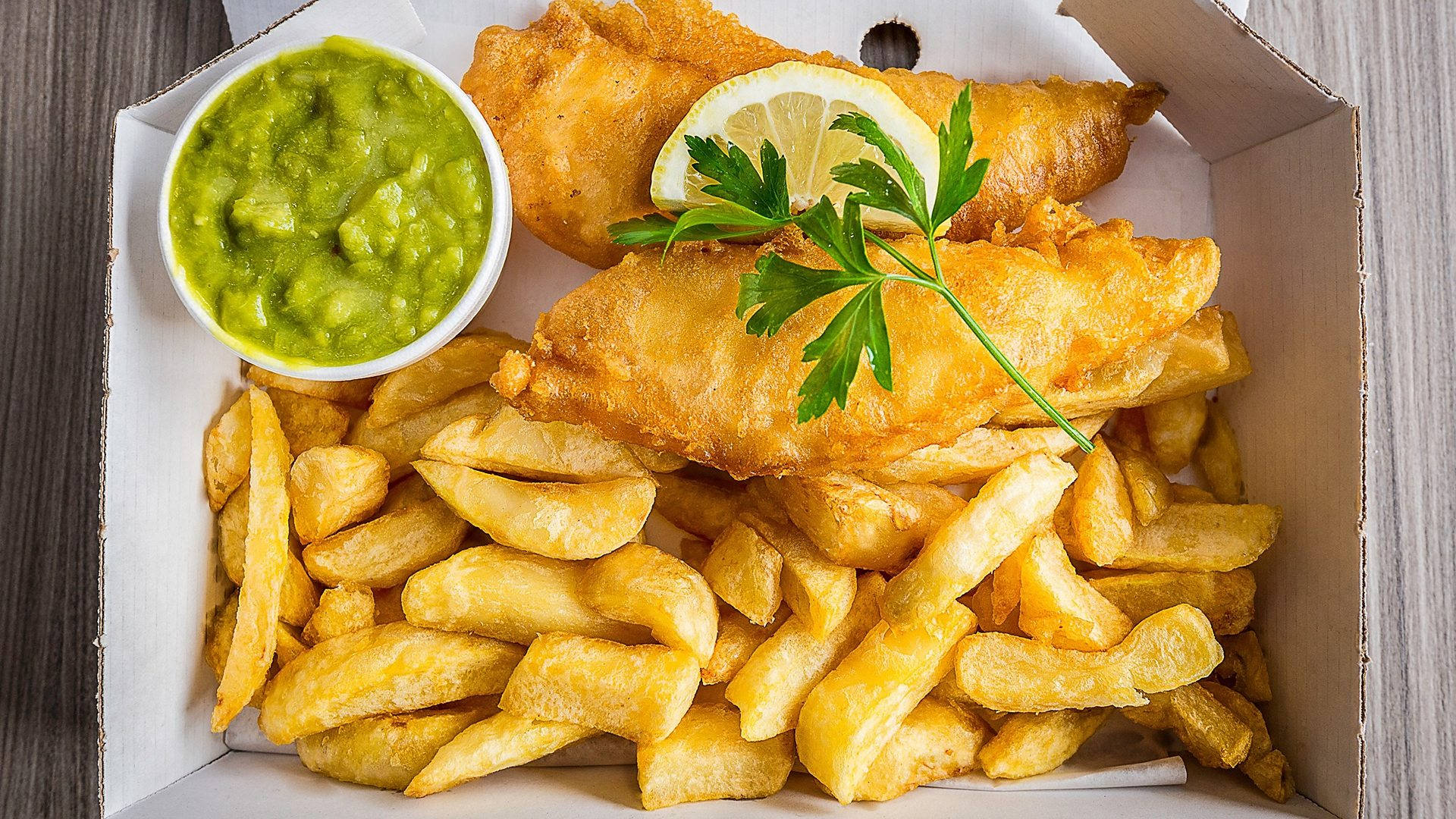 "Delicious Takeaway Box of Traditional Fish and Chips" Wallpaper