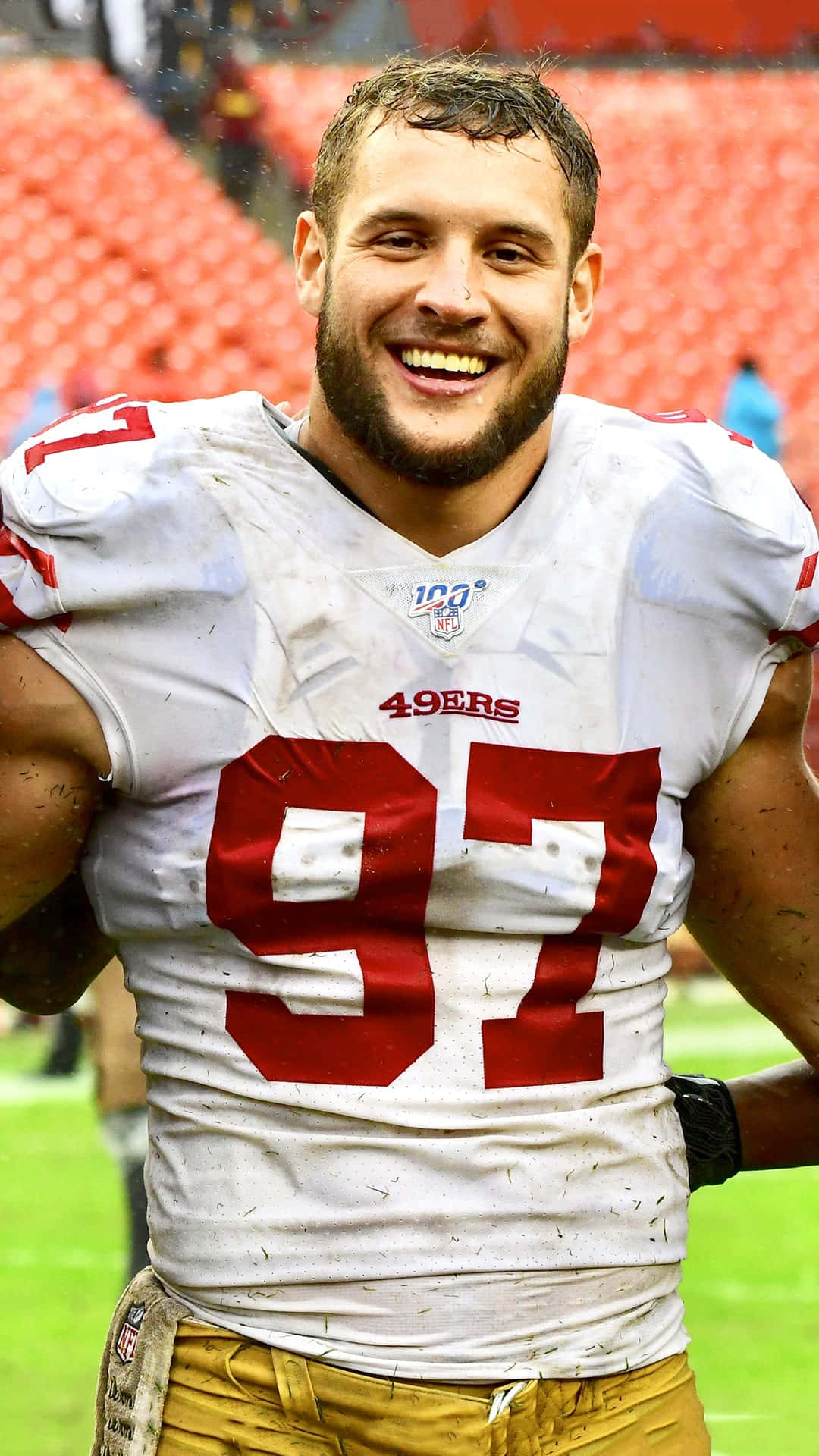 Nick Bosa making a game-changing tackle in the 2019 NFL season Wallpaper