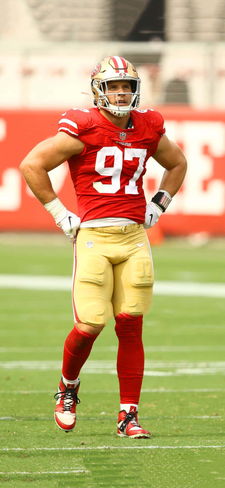 Download San Francisco 49ers defensive end Nick Bosa warms up before a game  Wallpaper