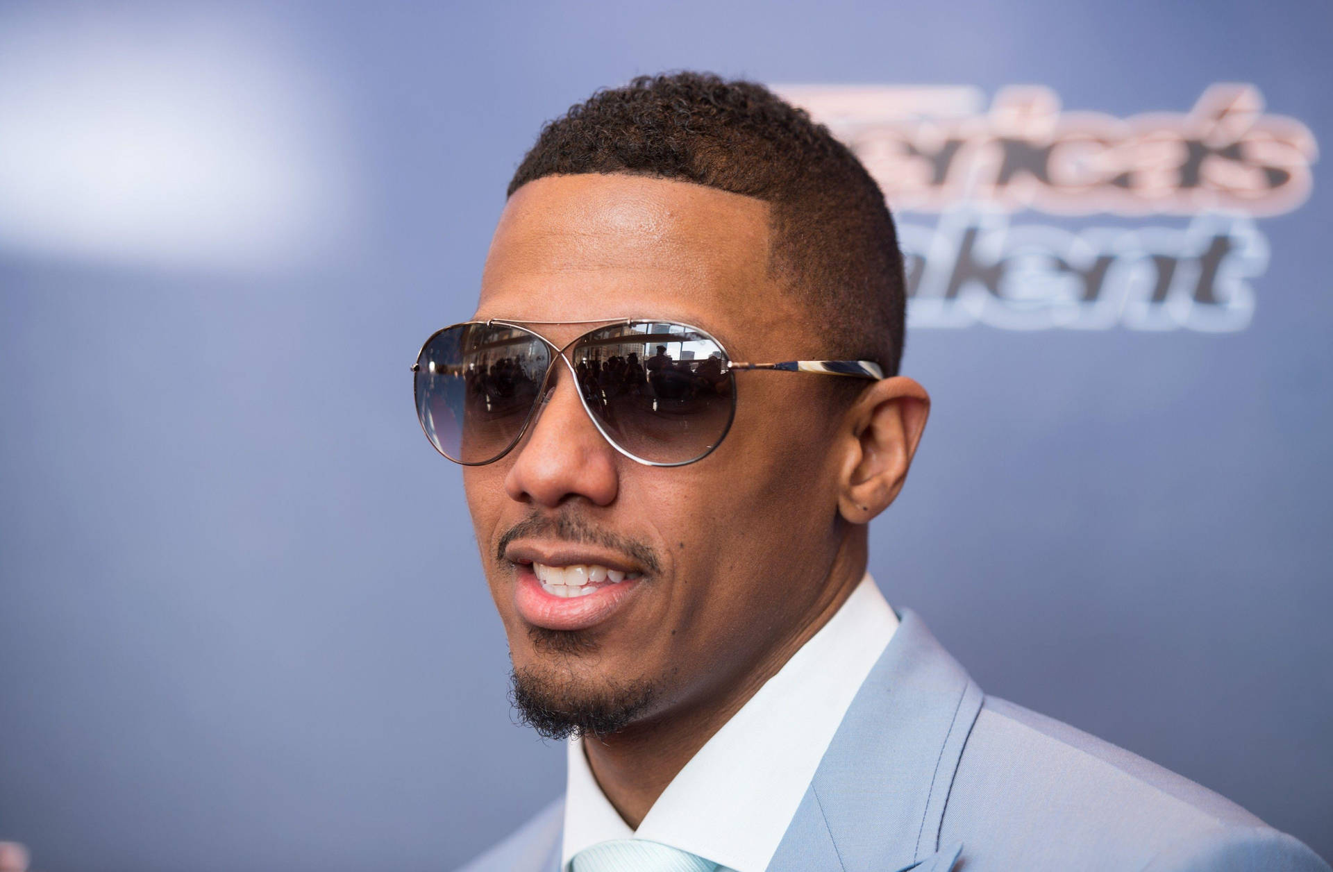 Nick Cannon Posing With Shades