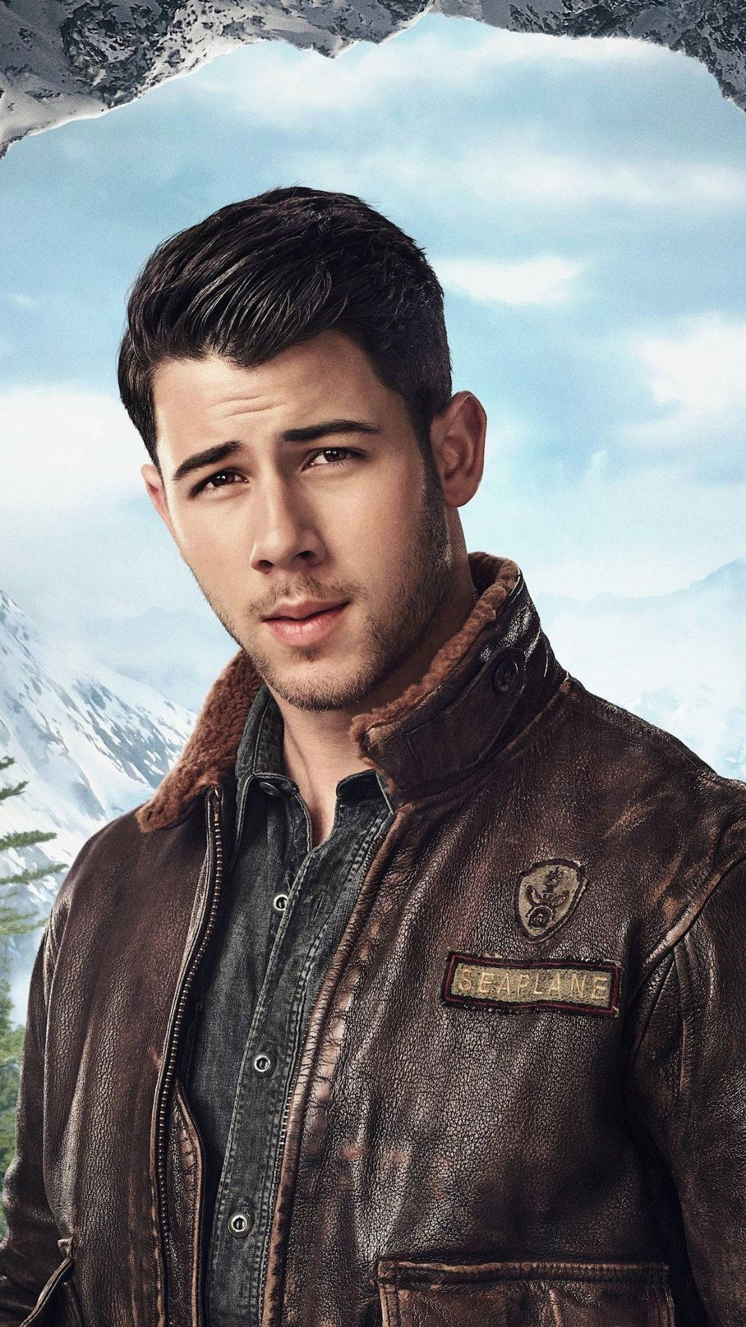 Nick Jonas In Leather Jacket Wallpaper