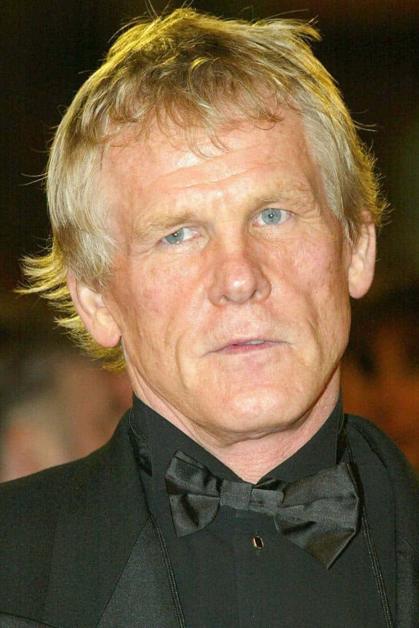 Actor Nick Nolte Embodying Classic Hollywood Masculinity Wallpaper
