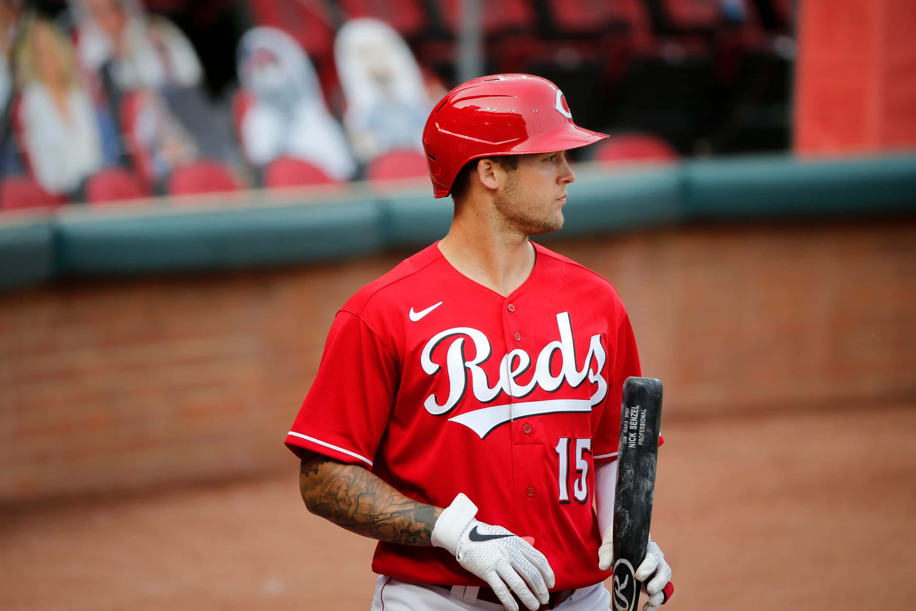 Nick Senzel In Mid-action During A Baseball Game. Wallpaper