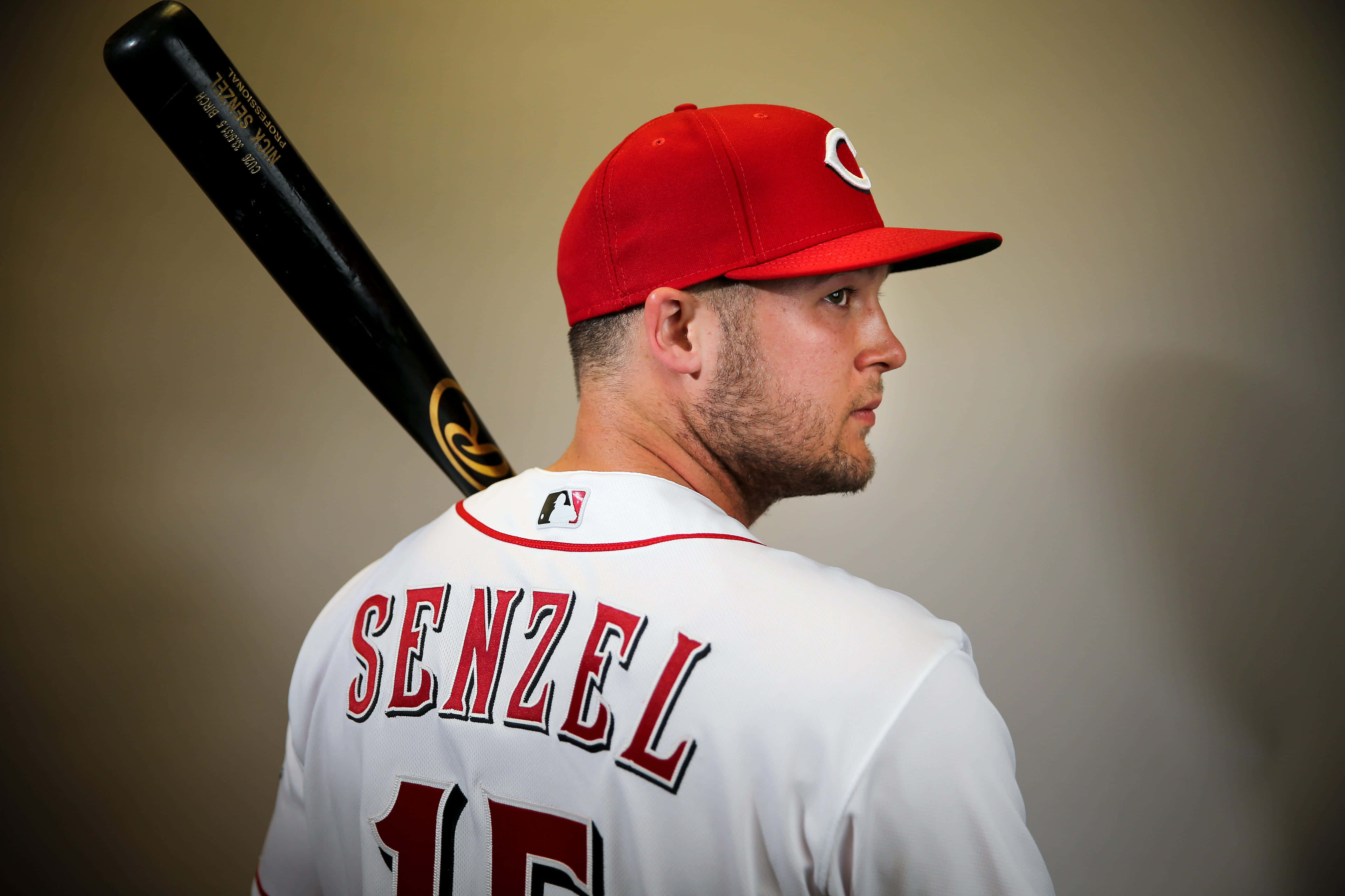 Nick Senzel Performing During A Baseball Game Wallpaper